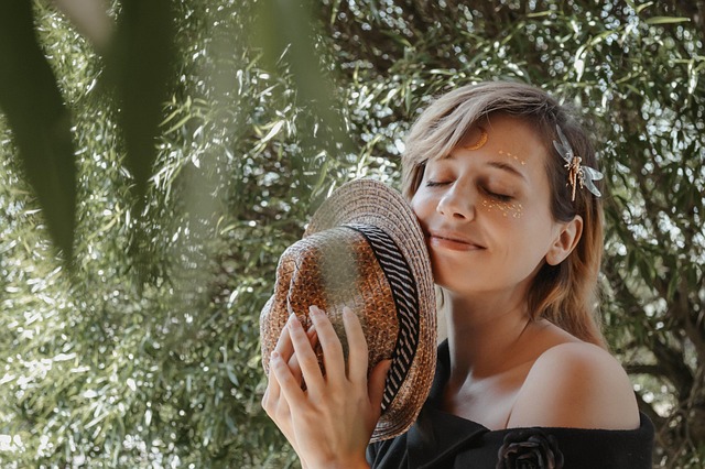 Woman gently massaging Blue Lagoon BL+ gel into her face and neck after cleansing